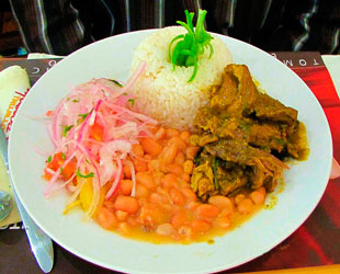 Seco de cabrito con frijoles