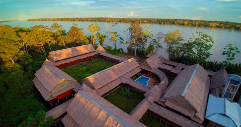 Travel down the Amazon River by boat